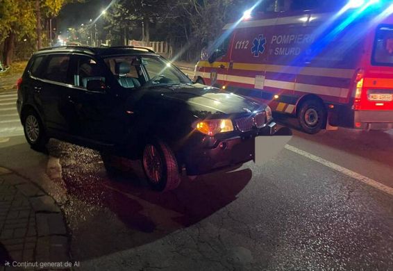 Femeie prinsa sub o masina  salvata de pompieri | imaginea 1